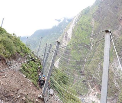 Rockfall barrier running along the steep gorge wall at Upper Bhotekoshi