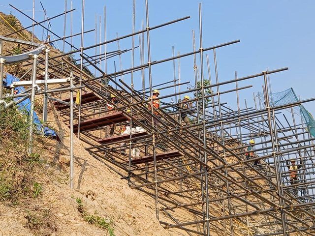 Scaffolding erected for anchor drilling on the Nagdhunga slope